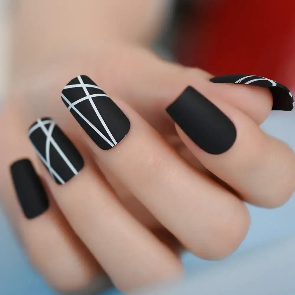 Matt Black Press-On Nails and More at Queen Afro’s Nail Collection