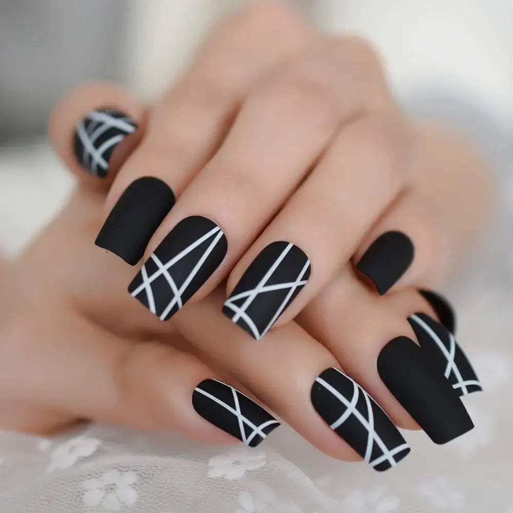 Matt Black Press-On Nails and More at Queen Afro’s Nail Collection